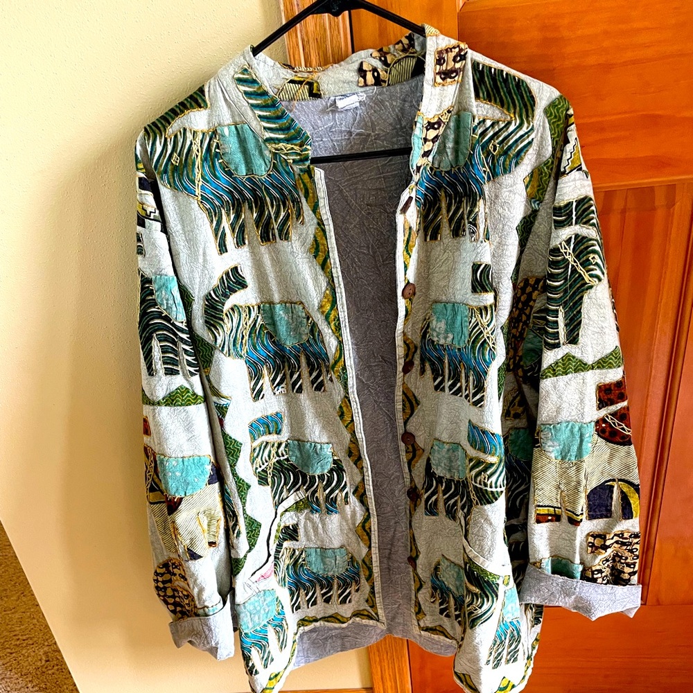 Women’s designer jacket. Made in India. Lots of hand stitching. Medium size.